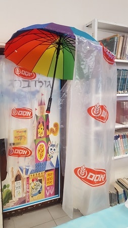 coatbrella - Umbrella with coat for maximum protection against rain