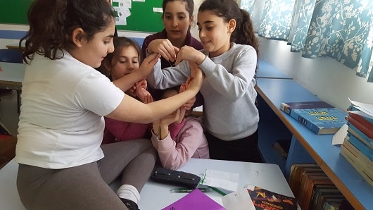Leadership members at Keshet School in Jerusalem demonstrate teamwork