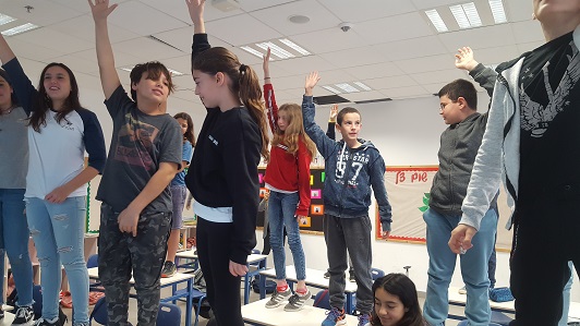students participate in the exercise of exiting the frame